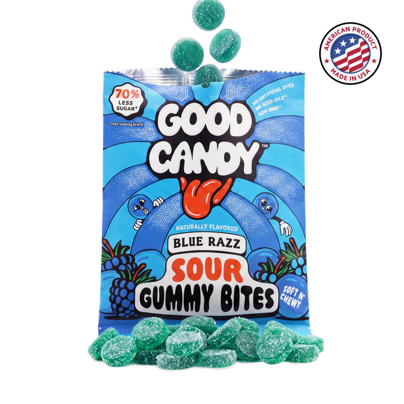 Teal blue raspberry gummies spilling out of an open Good Candy blue razz bag, with a Made in USA badge