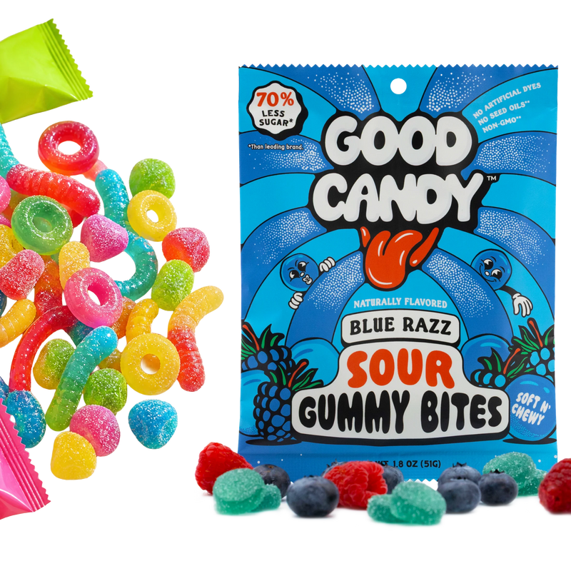 Good Candy Blue Razz low sugar sour gummy candy bag labeled 70% less sugar, with colorful gummy rings and worms scattered beside the package