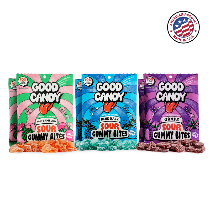 Watermelon, blue razz, and grape bags of Good Candy sour gummy candy lined up with piles of matching sugar-coated gummies and a Made in USA badge